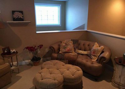a livingroom with newly painted walls