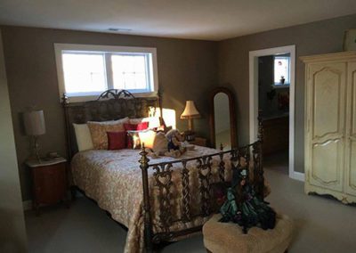 a bedroom with new painted gray walls