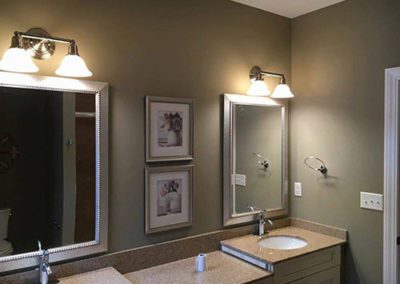 a green colored bathroom