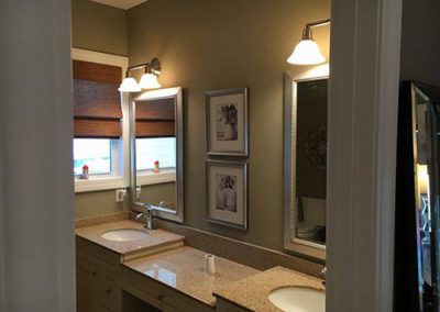 a bathroom with two sinks