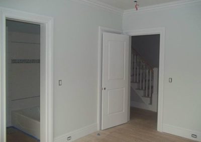 a room with white painted walls