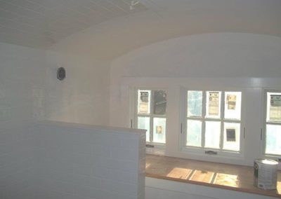a room with white painted walls