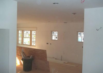 an empty room in process of being painted