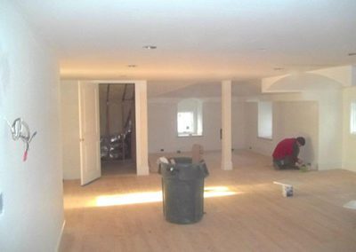 a finished basement getting painted
