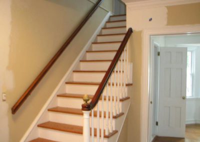 a stairway in the middle of being painted