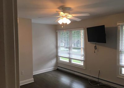 a newly painted wall, with a tv mounted