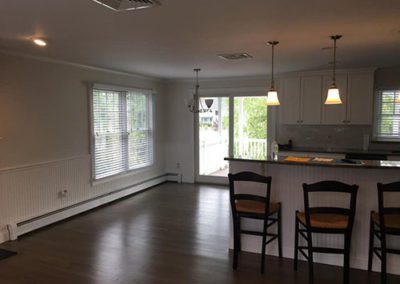 a kitchen with white colored walls
