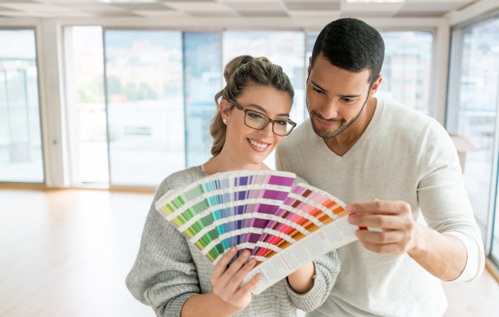 samples1 Man and Woman looking at paint samples